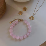 Saga små blomörhängen