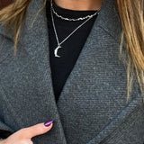 Titaniahalsband med hamrat månhänge