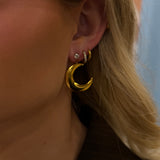 Titaniahalsband med hamrat månhänge