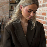 Titaniahalsband med hamrat månhänge