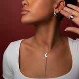 Titaniahalsband med hamrat månhänge